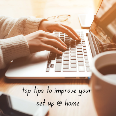 Someone working at a kitchen table